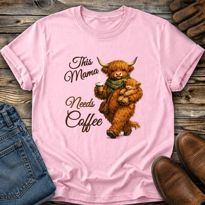 pink tshirt with a highland cow holding her calf and a cup of coffee that says this mama needs coffee