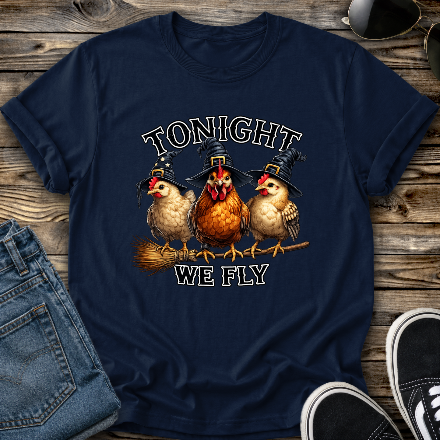 navy tshirt with funny chicken witches on a broomstick graphic design that says tonight we fly