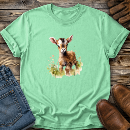 mint green tshirt with a watercolor style baby goat graphic on it