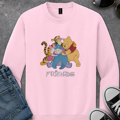 pink sweatshirt with an embroidered design of winnie the pooh friends