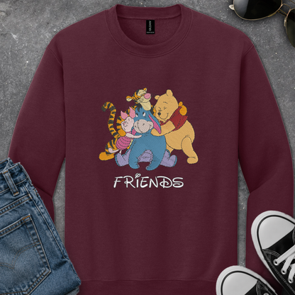 maroon sweatshirt with an embroidered design of winnie the pooh friends