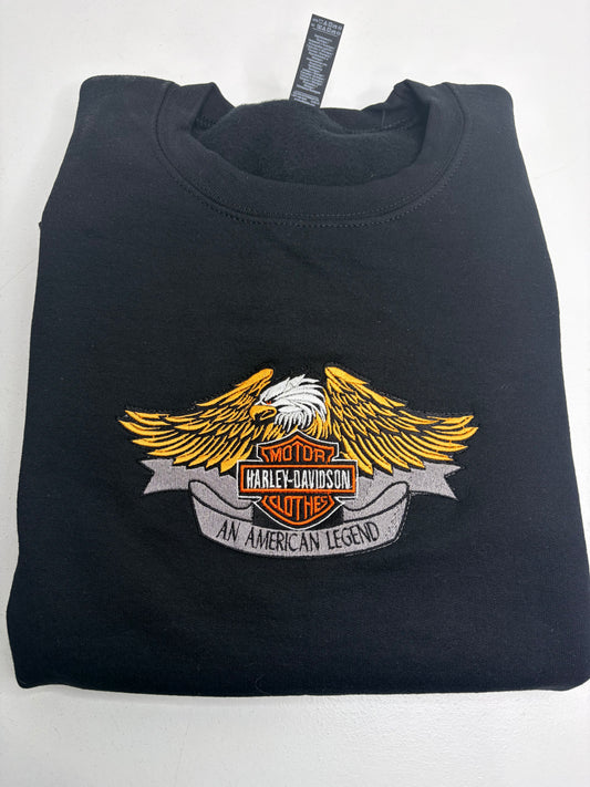 Black sweatshirt with Harley-Davidson logo on a white background