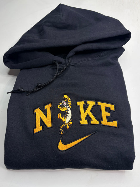 black sweatshirt with embroidered tigger in the middle of the nike logo
