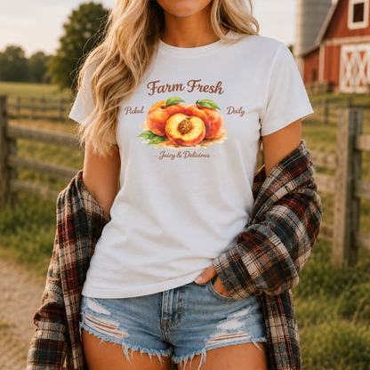 white tshirt with peaches graphic that says farm fresh picked daily