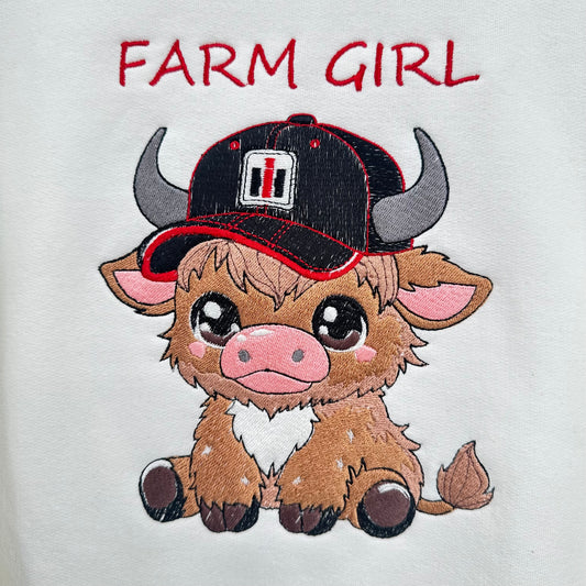 highland cow embroidered with a tractor logo on hat says farm girl
