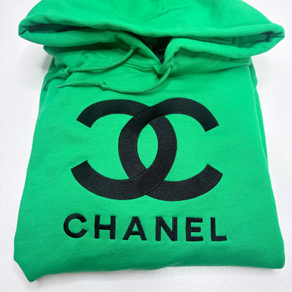 green hooded sweatshirt with chanel logo embroidered in black