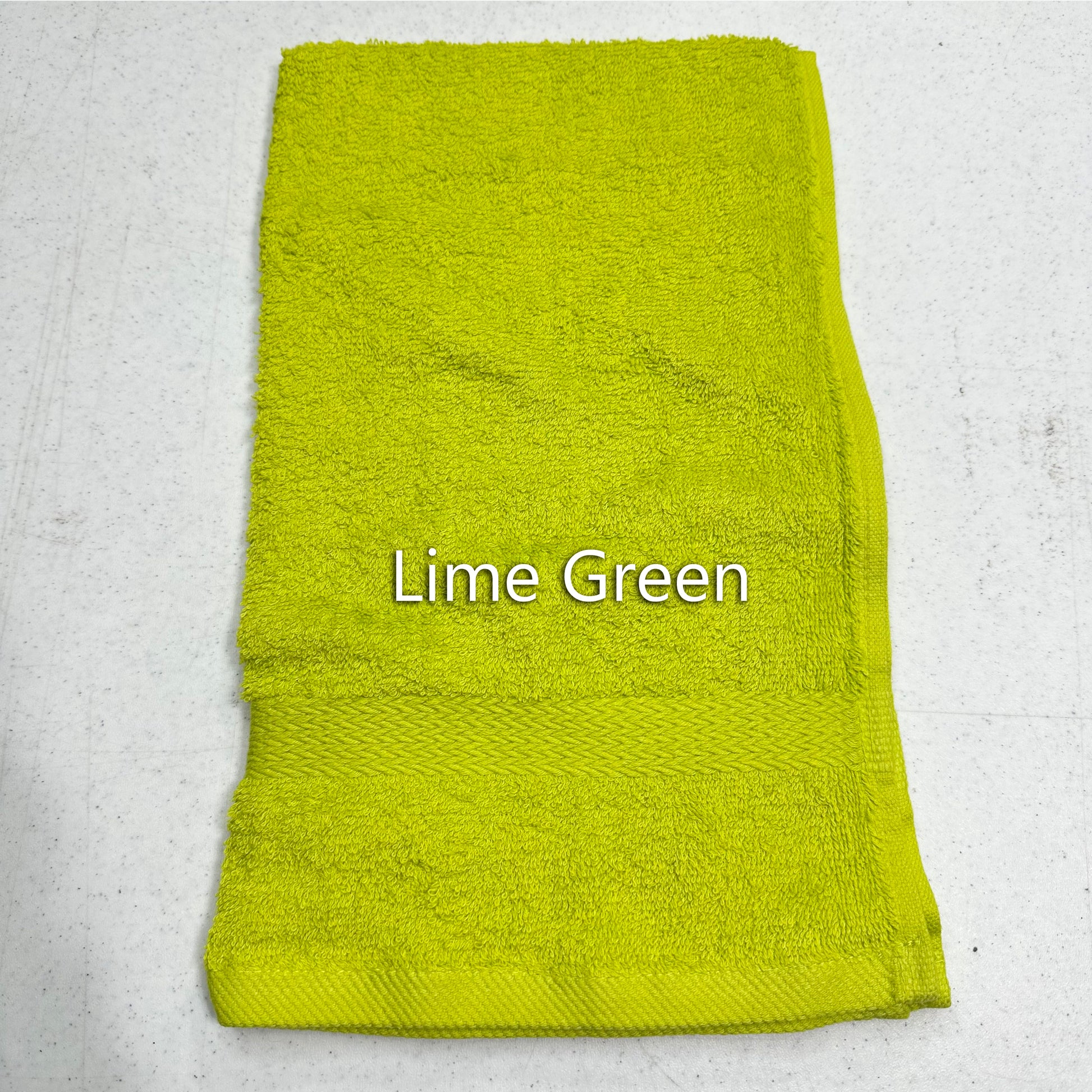 Lime green towel on a light gray background with 'Lime Green' text.