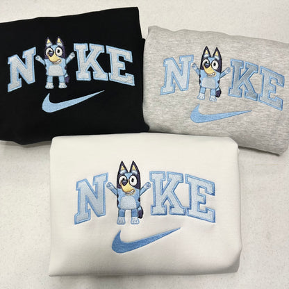 group shot of sweatshirts with nike logo and cartoon character on it