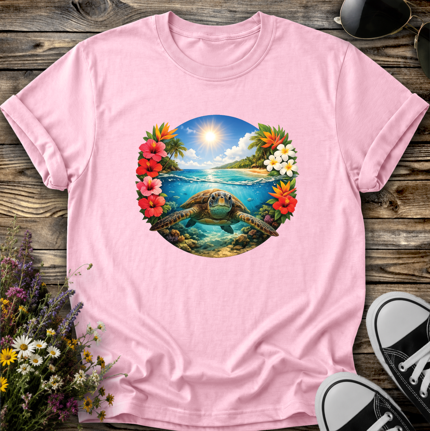 pink tshirt with a sea turtle underwater in the ocean with tropical flowers graphic