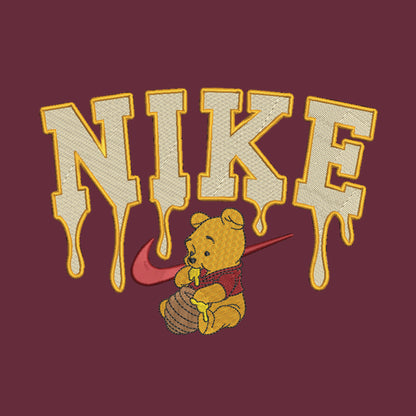maroon background with embroidered winnie the pooh with honey dripping from the nike logo